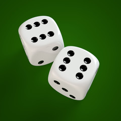 Zwei Spielwürfel auf grünem Tisch