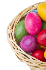 colorful easter eggs in basket