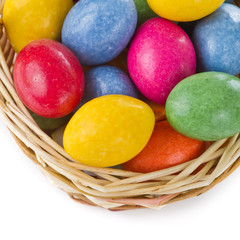 closeup of colorful easter eggs in basket