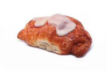 Fresh croissant with powdered sugar