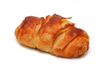 Single fresh croissant, casting soft shadow isolated on white