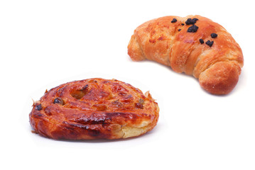 Croissant and cinnamon roll, bun isolated on white