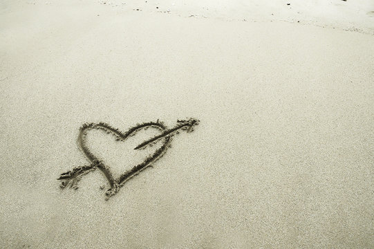 A heart drawn in sand