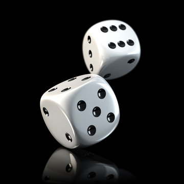 Zwei Spielw&uuml;rfel auf schwarzem Tisch