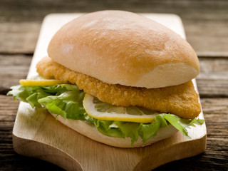 sandwich with breaded cutlet and lettuce