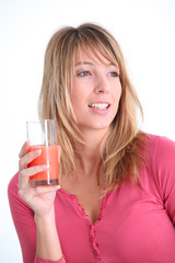 beautiful woman drinking tomato juice
