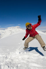 Girl jumping on a snow