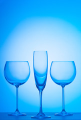 Wine glasses against gradient background