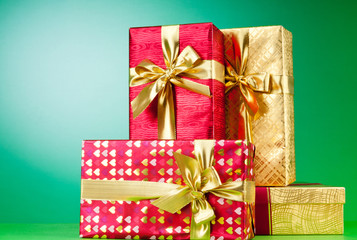 Celebration concept - Gift box against colorful background
