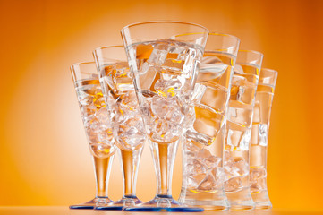 Water in the glass against gradient background