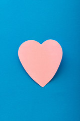 Heart shaped sticky notes on the background