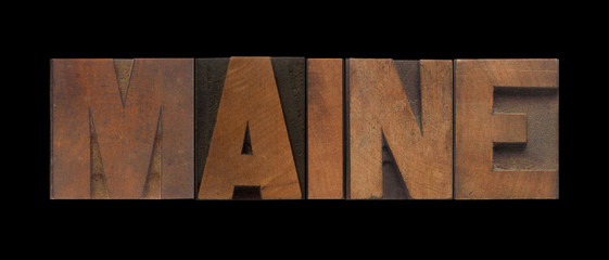 the word Maine in old wood type