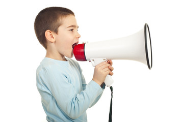 Profile of boy shouting loudpspeaker