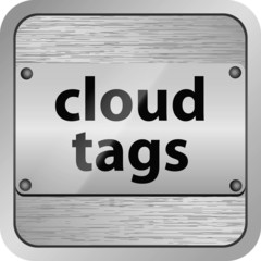 Cloud tags tablet attached on a brushed metal button