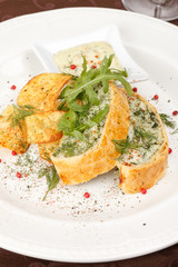 fish pie with sauce and potato chips