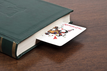 Book and joker card