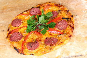 Freshly made pepperoni pizza