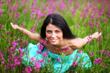 woman on pink flower field