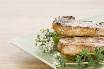 two pork steaks( space left for a text)