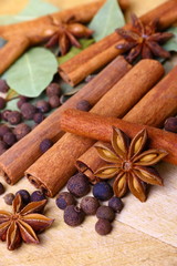 Fototapeta na wymiar Pack of several oriental spices, anise, cinnamon, pimento