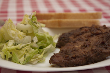 Steak with onion sauce