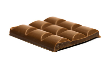 Close up of chocolate piece, on white background