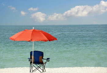 red umbrela on the beach