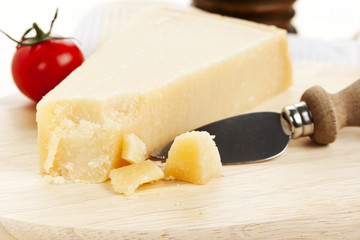 parmesan cheese with knife