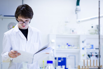 young male researcher carrying out scientific research