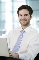 young businessman with laptop