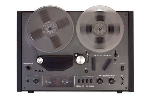 reel tape recorder on a white background