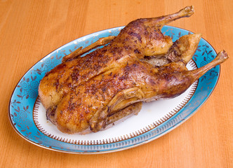 Roasted duck on the table..