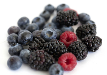 Blueberry, blackberry and raspberry on the white background