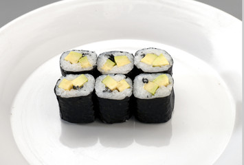 six appetizer sushi with avocado