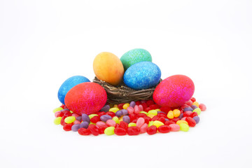 Fototapeta na wymiar Colored Easter Eggs on Jelly Beans