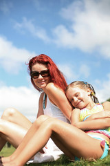 Fototapeta premium Happy mother and daughter enjoy summer day.