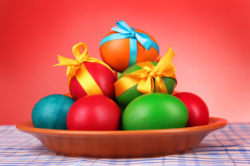 Fototapeta na wymiar Easter eggs with bows isolated on white