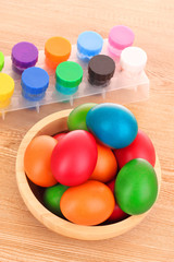 Fototapeta na wymiar easter eggs, color paint and brush