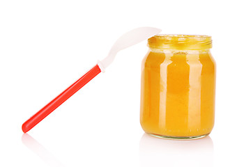 food for children and spoon on white background