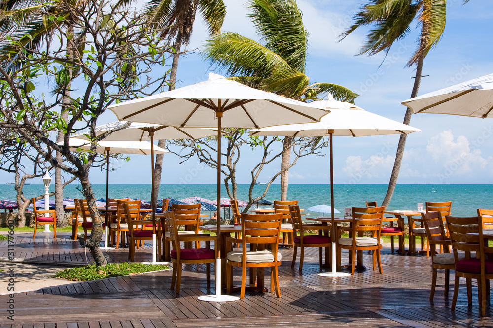 Wall mural Table with a beautiful sea view . Thailand .