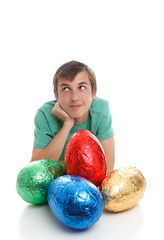 Fototapeta premium Boy with large easter eggs