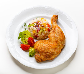 Roasted chicken leg, rice and vegetables