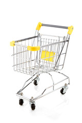 Empty shopping trolley on white background