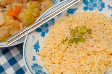 Oriental noodles and side dish