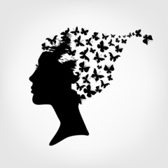 Female silhouette and butterfly