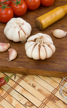 set of garlic nutrition and healthy food on wood
