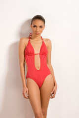 Fototapeta premium Creole ethnic woman in red one piece swimsuit