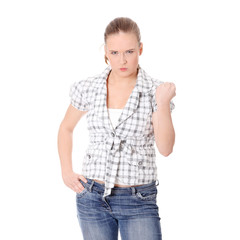 Young angry woman with fist up.