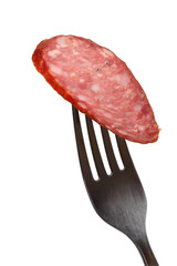 Smoked sausage on a fork