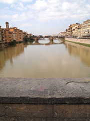 Fototapeta premium Arno river and Ponte alle Grazie Bridge Firenze, Italy
